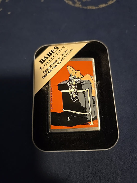 1999 Zippo Limited Edition Playboy "Babe in Chair" Babes Collection In Tin