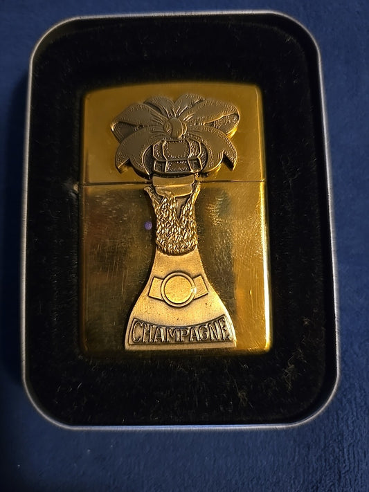 ZIPPO 1996 BARRETT SMYTHE CHAMPAGNE SURPRISE EMBLEM LIGHTER UNFIRED